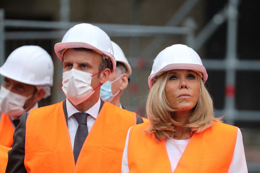 French President Emmanuel Macron and his wife Brigitte Macron visit the castle of Villers-Cotterets under renovation, during a one-day visit to Northern France, on June 17, 2021. (Photo by PASCAL ROSSIGNOL / POOL / AFP)